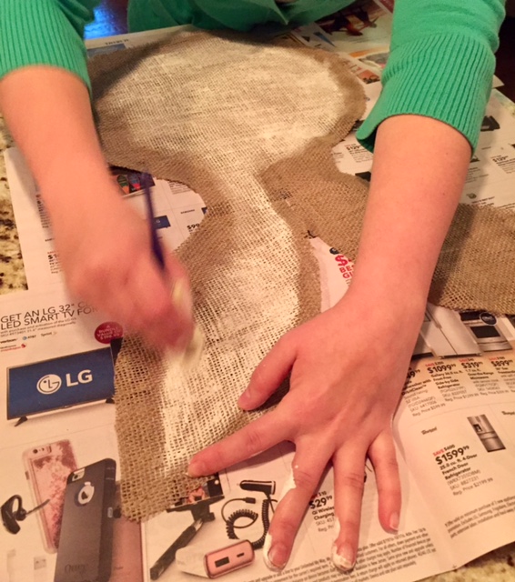 Super cute and easy DIY Tutorial to make Easter Burlap Door Hangers with step by step instructions, materials list, and lots of pictures!