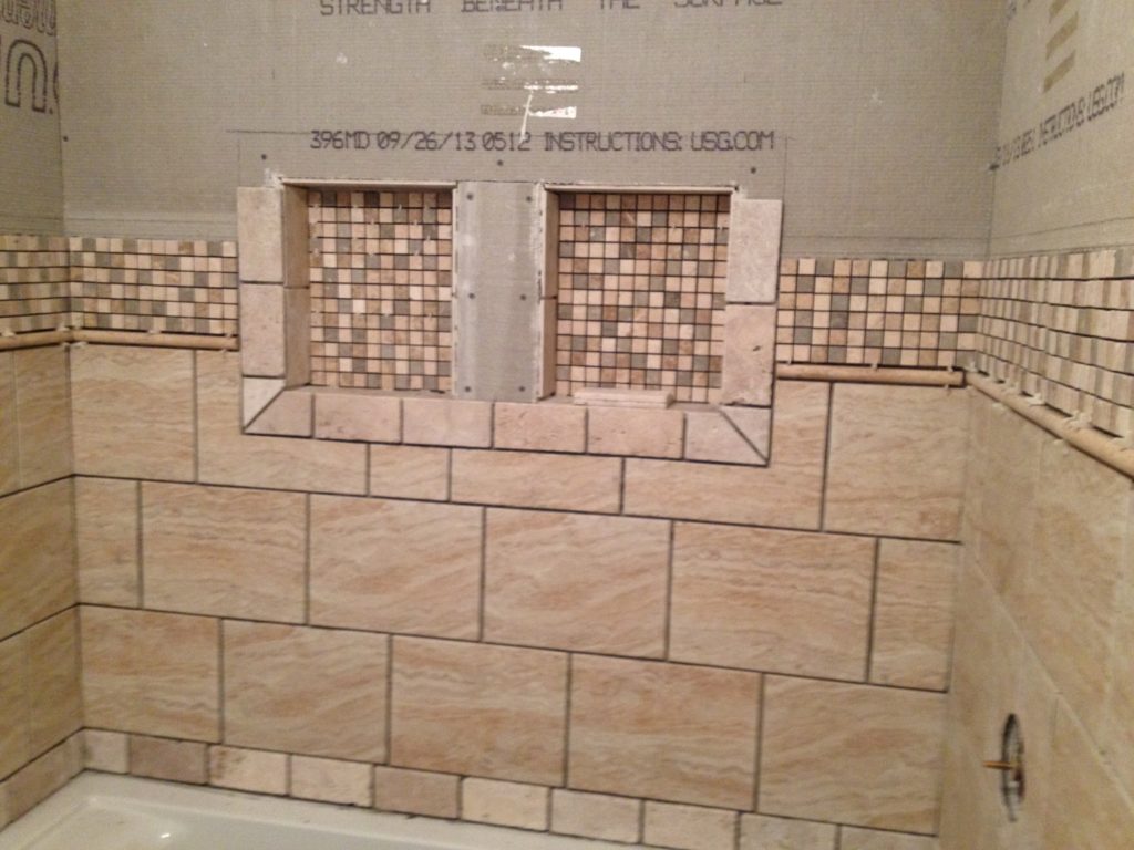 A full bathroom tear out and renovation, complete with tile shower, new vanity, and décor. Check out this bathroom renovation!