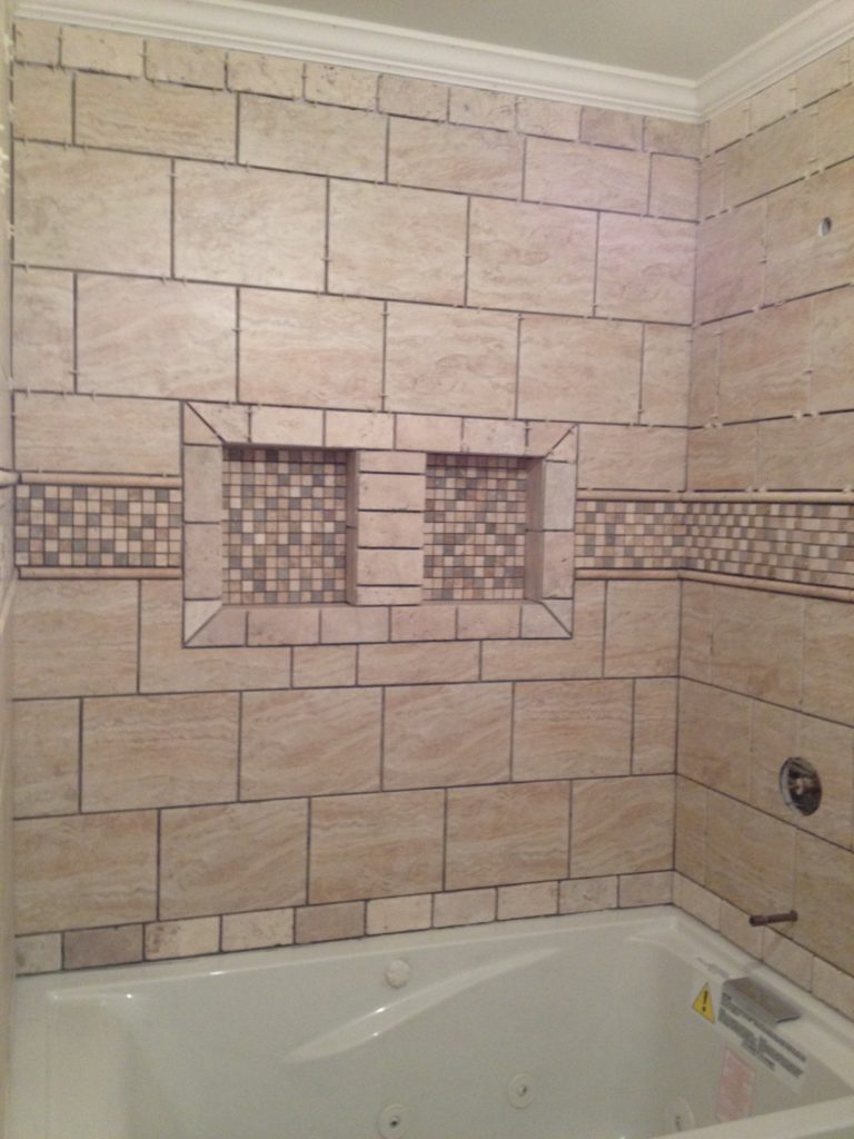 A full bathroom tear out and renovation, complete with tile shower, new vanity, and décor. Check out this bathroom renovation!