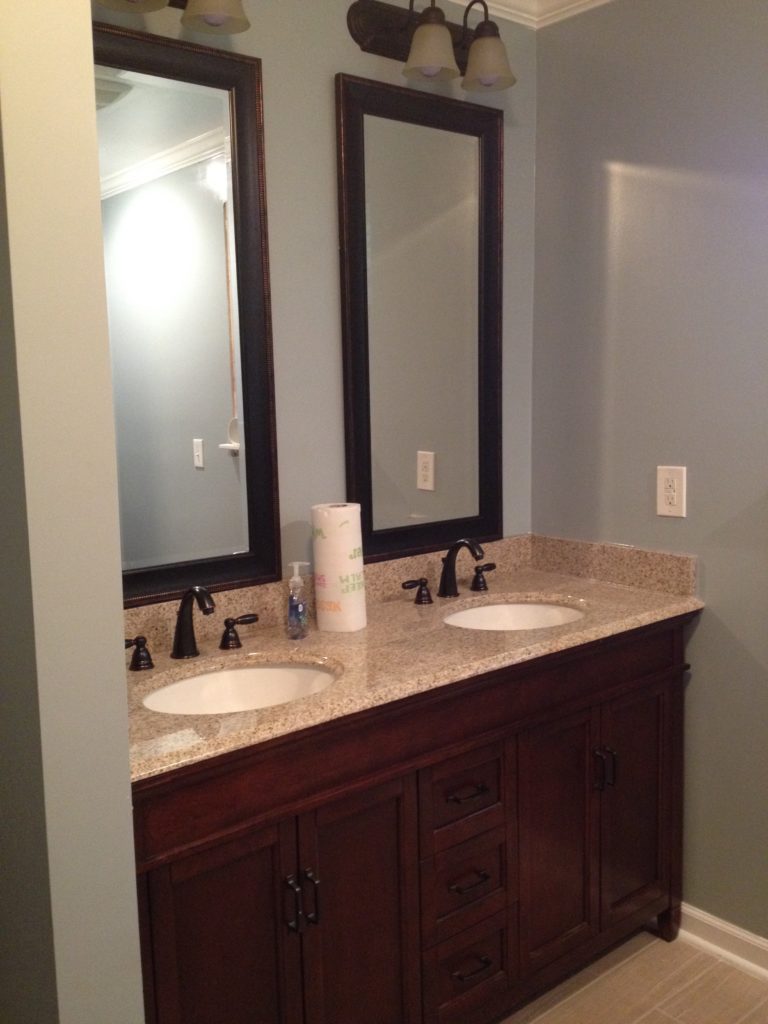 A full bathroom tear out and renovation, complete with tile shower, new vanity, and décor. Check out this bathroom renovation!