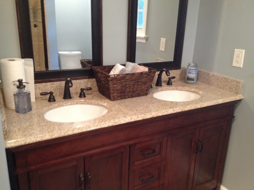 A full bathroom tear out and renovation, complete with tile shower, new vanity, and décor. Check out this bathroom renovation!