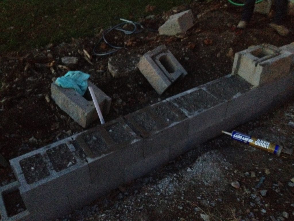 A DIY Patio Build on a budget. Check out how we built this patio on a limited budget and with limited supplies! A beautiful outdoor space! 