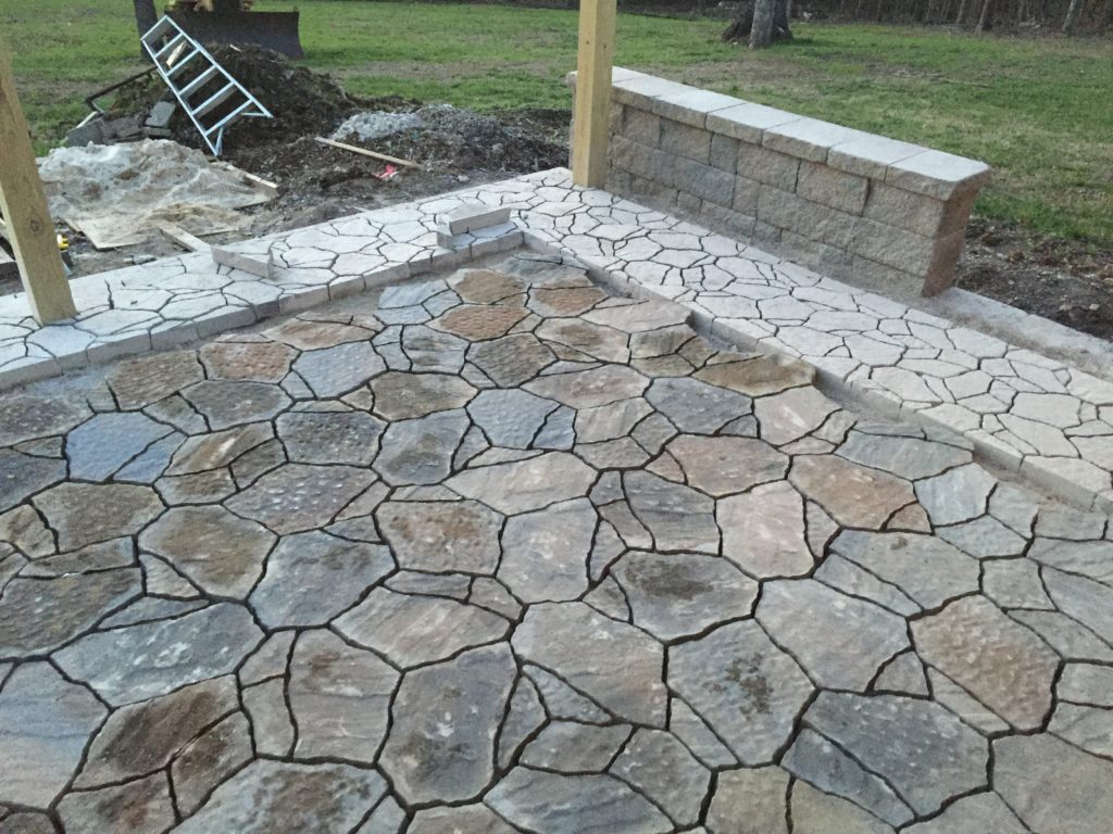 A DIY Patio Build on a budget. Check out how we built this patio on a limited budget and with limited supplies! A beautiful outdoor space! 
