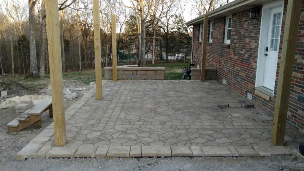 A DIY Patio Build on a budget. Check out how we built this patio on a limited budget and with limited supplies! A beautiful outdoor space! 