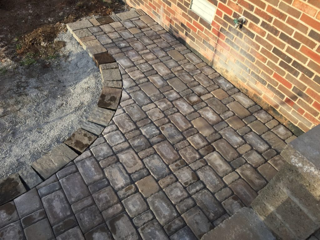 A DIY Patio Build on a budget. Check out how we built this patio on a limited budget and with limited supplies! A beautiful outdoor space! 