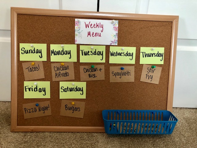 Eliminate stress and save money by planning your meals for the week ahead. To help you stick to the plan, you will want a visual like this super easy DIY menu board that you can make with no tools.