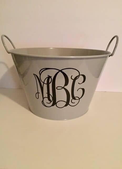 This is a great beginner project for Cricut crafters! Learn how to make a monogram drink bucket for a gift basket, bridal shower, or party drink bucket!