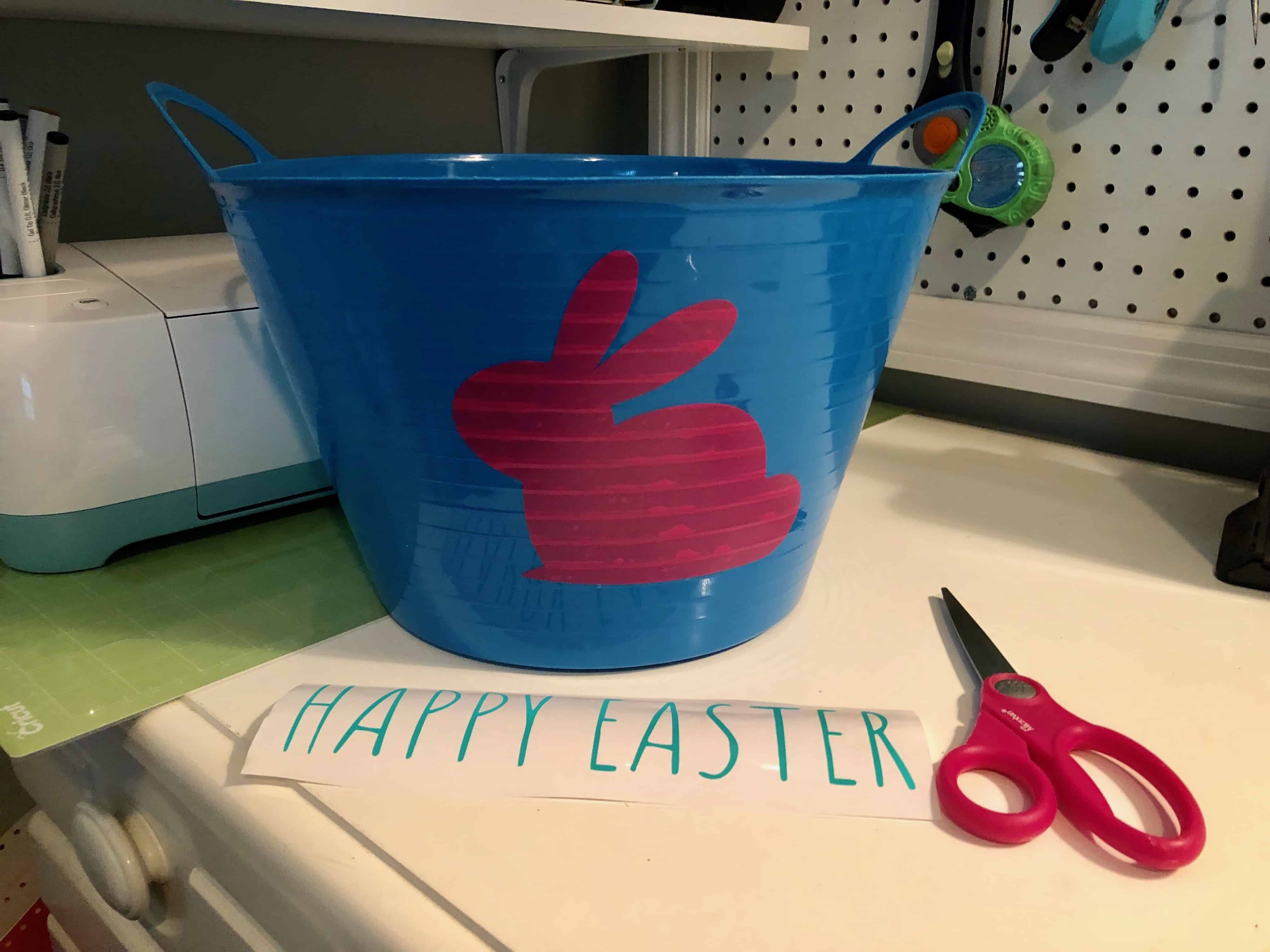 Make your own DIY Easter bucket with the Cricut Explore easily and very affordably. This super cheap and easy DIY Easter project is so fun to make. Fill your DIY Easter basket with items from the Dollar Tree for a frugal Easter present.
