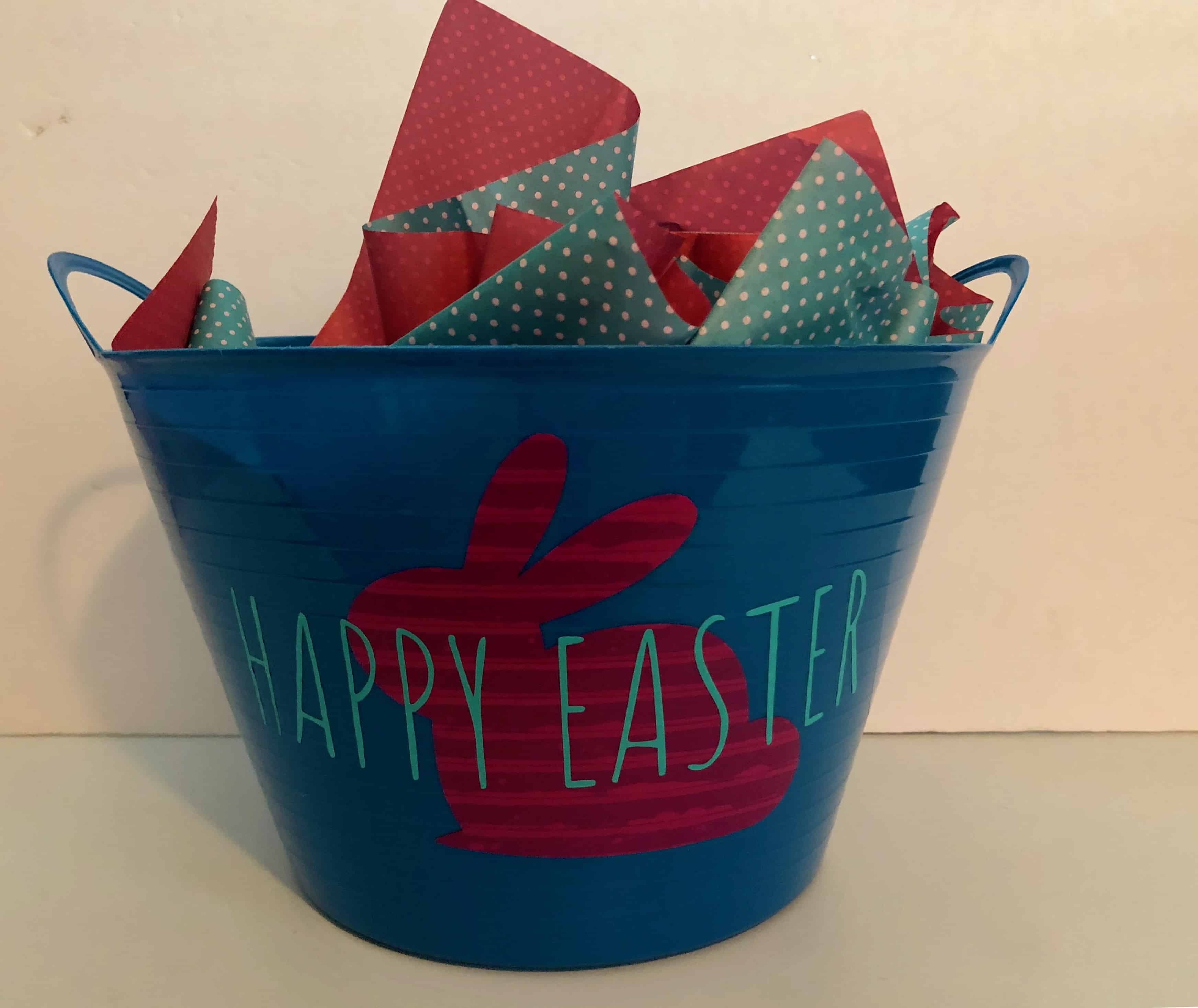 Make your own DIY Easter bucket with the Cricut Explore easily and very affordably. This super cheap and easy DIY Easter project is so fun to make. Fill your DIY Easter basket with items from the Dollar Tree for a frugal Easter present.