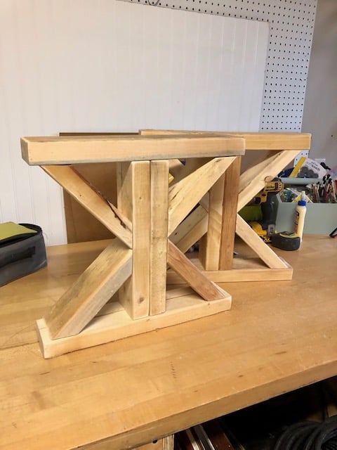 Make this farmhouse DIY dining room bench for under $20! Perfect for small spaces, front porches, and to add extra seating with storage underneath. 