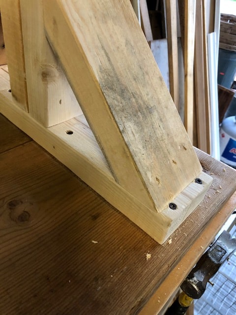 Make this farmhouse DIY dining room bench for under $20! Perfect for small spaces, front porches, and to add extra seating with storage underneath. 