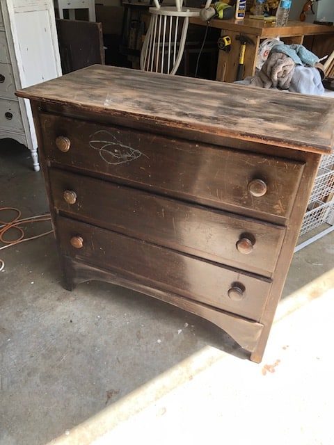 This DIY yard sale dresser makeover was simple and I love the white rustic, farmhouse, vintage look of it! Check it out for ideas for your own DIY!
