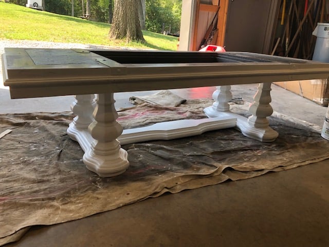 Check out this amazing DIY wooden glasstop painted coffee table makeover! The before and after will give you ideas for a rustic farmhouse look!