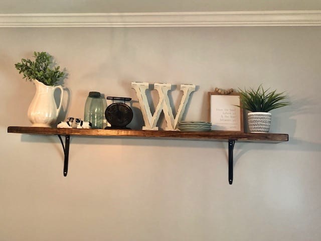 This DIY dining room makeover on a budget is perfect for our small farmhouse home. Check out the before and after to get ideas for your own!