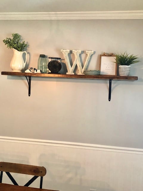 This DIY dining room makeover on a budget is perfect for our small farmhouse home. Check out the before and after to get ideas for your own!