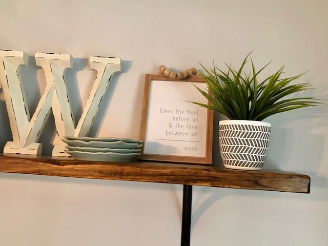 This DIY dining room makeover on a budget is perfect for our small farmhouse home. Check out the before and after to get ideas for your own!