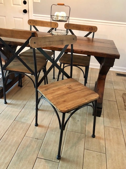 This DIY dining room makeover on a budget is perfect for our small farmhouse home. Check out the before and after to get ideas for your own!