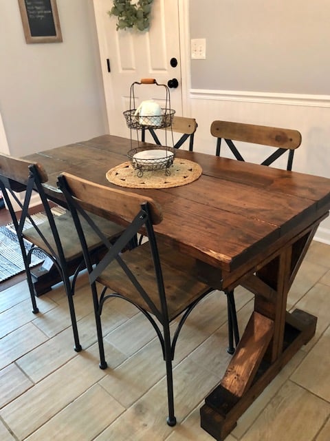 This DIY dining room makeover on a budget is perfect for our small farmhouse home. Check out the before and after to get ideas for your own!