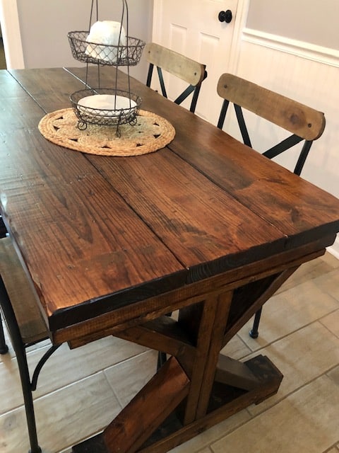 This DIY dining room makeover on a budget is perfect for our small farmhouse home. Check out the before and after to get ideas for your own!