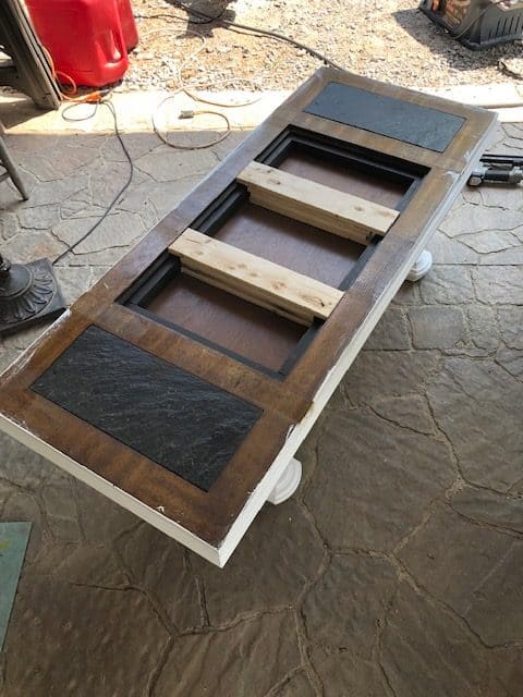 Check out this amazing DIY wooden glasstop painted coffee table makeover! The before and after will give you ideas for a rustic farmhouse look!