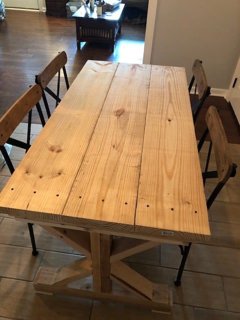 This DIY dining room makeover on a budget is perfect for our small farmhouse home. Check out the before and after to get ideas for your own!