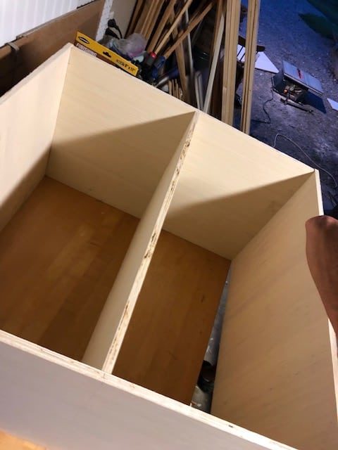 We made this DIY dog food station for dog food storage for food, treats, and toys. The pull out drawer is perfect for scooping dog food. Organize dog food