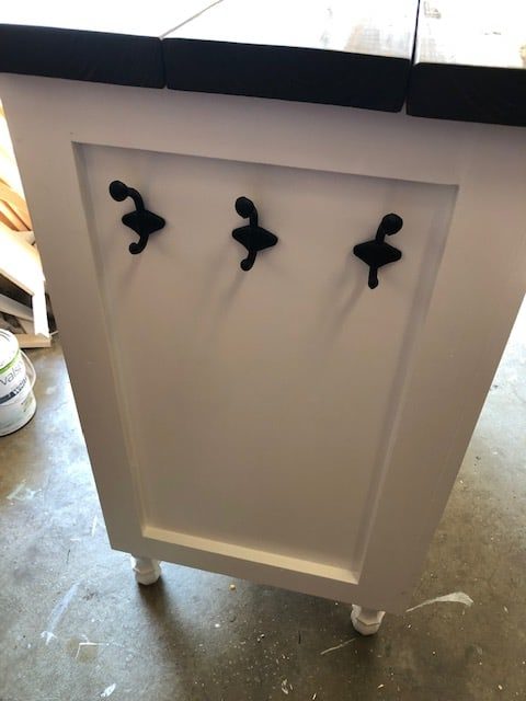 We made this DIY dog food station for dog food storage for food, treats, and toys. The pull out drawer is perfect for scooping dog food. Organize dog food