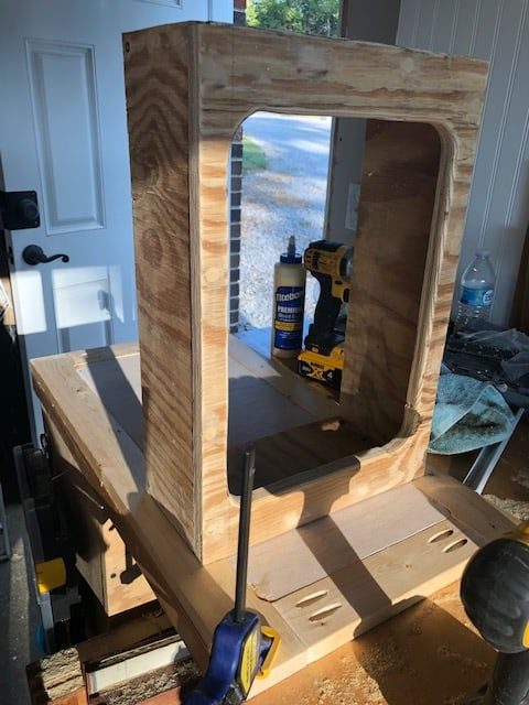 We made this DIY dog food station for dog food storage for food, treats, and toys. The pull out drawer is perfect for scooping dog food. Organize dog food