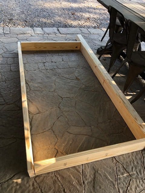See how I made a DIY day bed on a budget with this tutorial. I used an old vintage door to create a headboard and built a wooden day bed frame.