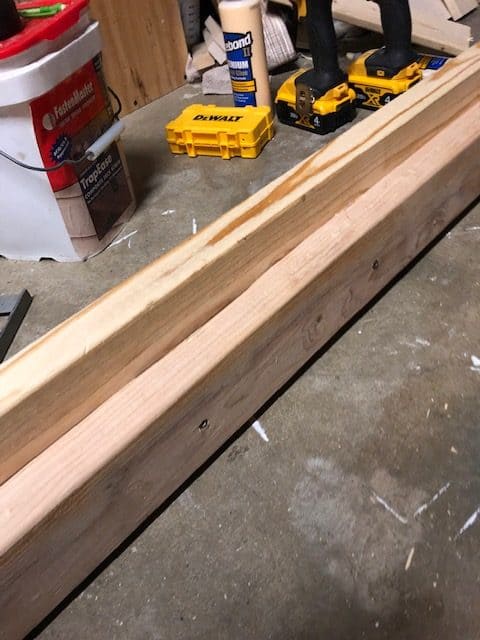 See how I made a DIY day bed on a budget with this tutorial. I used an old vintage door to create a headboard and built a wooden day bed frame.