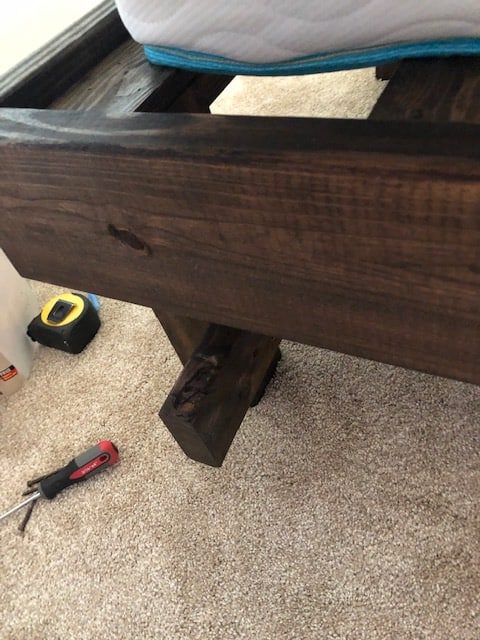 See how I made a DIY day bed on a budget with this tutorial. I used an old vintage door to create a headboard and built a wooden day bed frame.