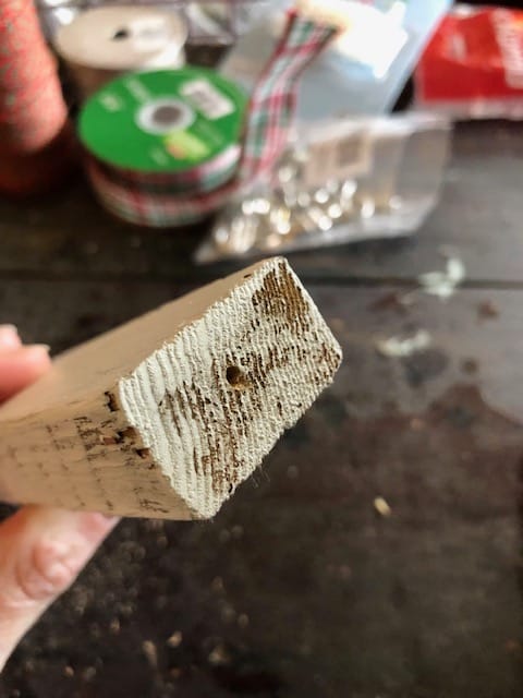 Make your own easy, rustic DIY Christmas ornaments with tobacco sticks. These are perfect for kids, to sell, for gifts, or to decorate your tree. 