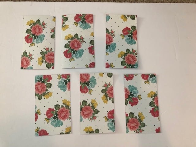 Learn how to make your own DIY closet dividers to organize your baby's or kid's clothes by size. These hanging dividers are perfect for nursery organization
