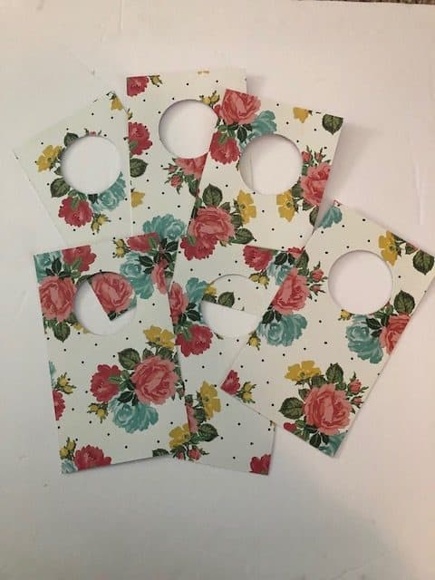 Learn how to make your own DIY closet dividers to organize your baby's or kid's clothes by size. These hanging dividers are perfect for nursery organization