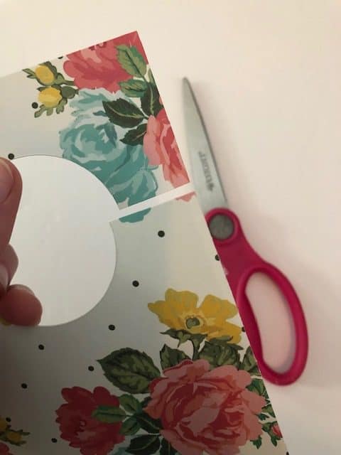Learn how to make your own DIY closet dividers to organize your baby's or kid's clothes by size. These hanging dividers are perfect for nursery organization