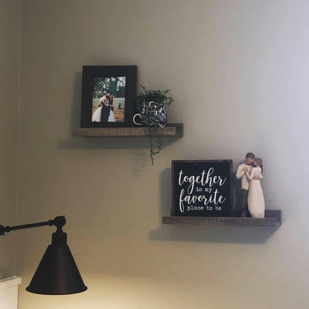 This budget friendly bedroom makeover was so fun to create with Walmart decor, DIY wall art, a gallery wall, frugal bedding, and wall sconces.