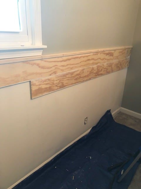 See how we made this easy and budget friendly DIY shiplap headboard wall for our bedroom makeover. Full materials list and step by step directions!