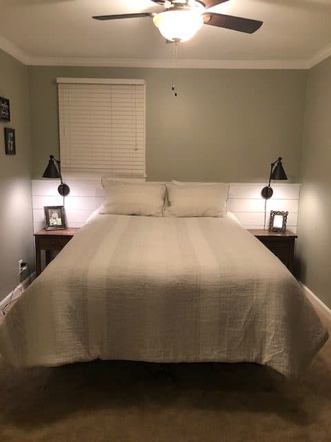 This budget friendly bedroom makeover was so fun to create with Walmart decor, DIY wall art, a gallery wall, frugal bedding, and wall sconces.