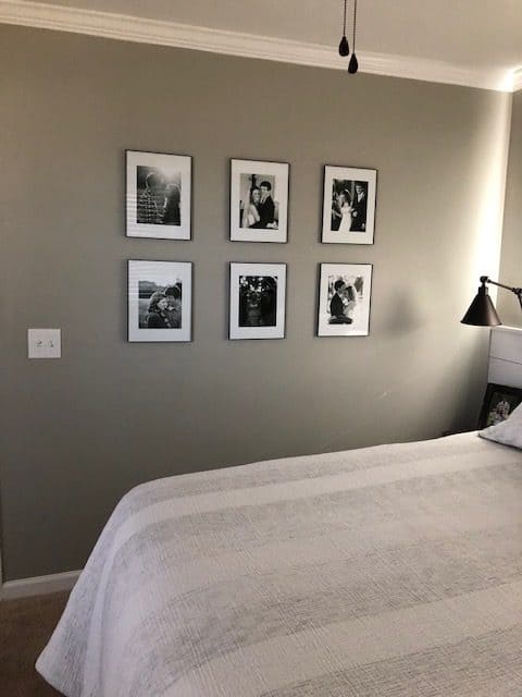 See how we made a DIY cheap gallery wall with these affordable Walmart frames. Perfect for a bedroom, hallway, living room, or kitchen.