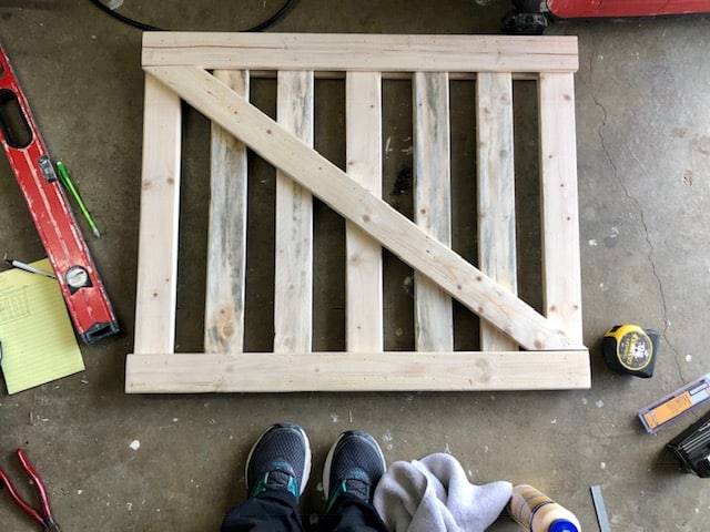 This DIY baby gate project was easy and affordable to make. It works great as a dog gate or pet gate, too. Full step by step tutorial and plans to make it!