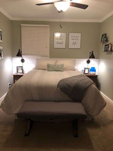 This budget friendly bedroom makeover was so fun to create with Walmart decor, DIY wall art, a gallery wall, frugal bedding, and wall sconces.