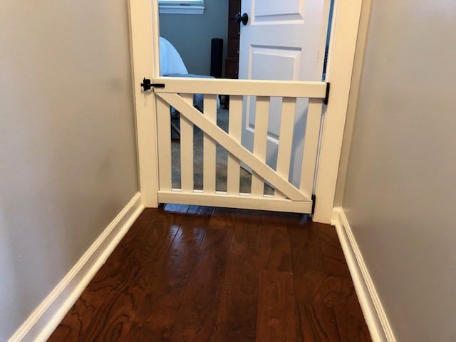This DIY baby gate project was easy and affordable to make. It works great as a dog gate or pet gate, too. Full step by step tutorial and plans to make it!