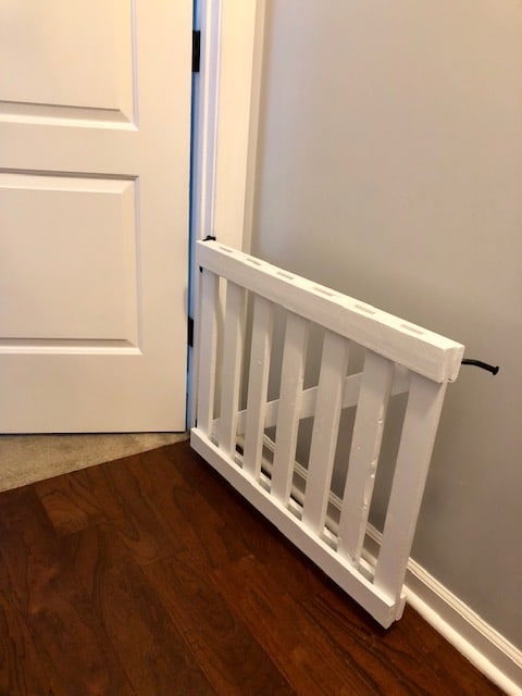This DIY baby gate project was easy and affordable to make. It works great as a dog gate or pet gate, too. Full step by step tutorial and plans to make it!