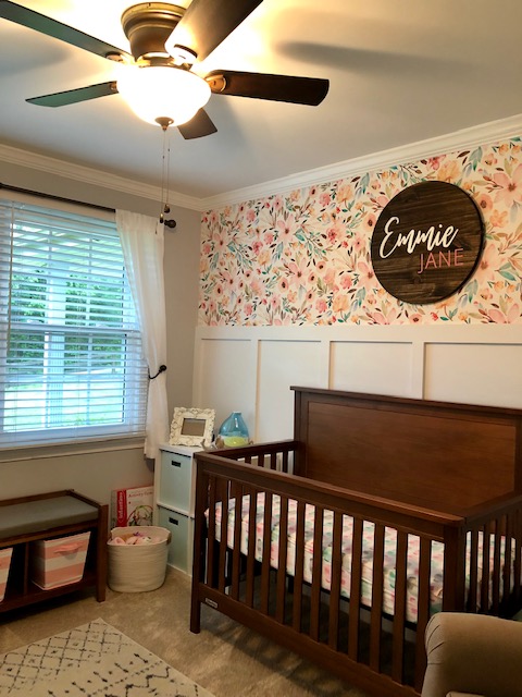 Come take a tour of our baby girl's wildflower nursery room! The wall paper, board and batten wall, cube organizers, and name sign make this room so sweet!