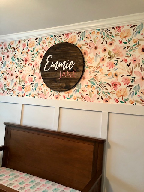 Come take a tour of our baby girl's wildflower nursery room! The wall paper, board and batten wall, cube organizers, and name sign make this room so sweet!