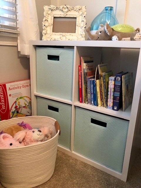 Come take a tour of our baby girl's wildflower nursery room! The wall paper, board and batten wall, cube organizers, and name sign make this room so sweet!