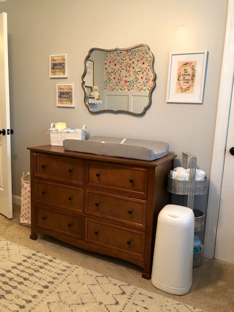 Come take a tour of our baby girl's wildflower nursery room! The wall paper, board and batten wall, cube organizers, and name sign make this room so sweet!