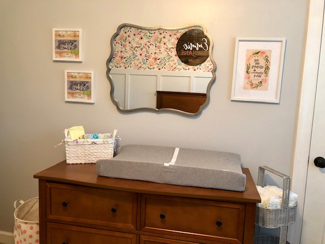 Come take a tour of our baby girl's wildflower nursery room! The wall paper, board and batten wall, cube organizers, and name sign make this room so sweet!