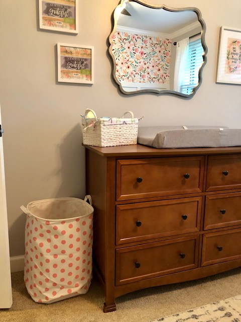 Come take a tour of our baby girl's wildflower nursery room! The wall paper, board and batten wall, cube organizers, and name sign make this room so sweet!