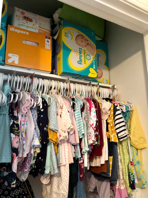 Come take a tour of our baby girl's wildflower nursery room! The wall paper, board and batten wall, cube organizers, and name sign make this room so sweet!
